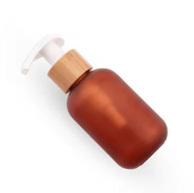 China 24/410 28/410 Cosmetic Bottle Bamboo Closure Wooden Lotion Pump for sale