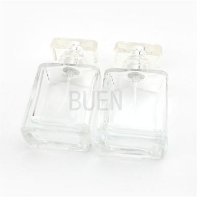 중국 50ml Square Transparent Perfume Bottle With Multicolor Cap 판매용