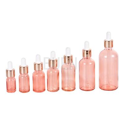 China Rose Gold Dropper Bottle Packaging Glass Small Dropper Bottles 1oz for sale