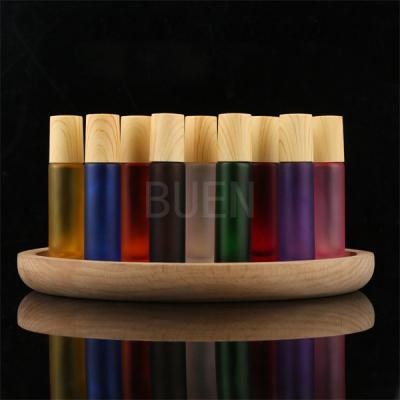 China Beweis-Glas-Rolle des Leck-10ml auf Flaschen-Hautpflege mit Bambuskappe zu verkaufen