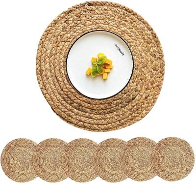 China Sustainable natural woven round and oval hand-stitched woven water hyacinth rug for sale