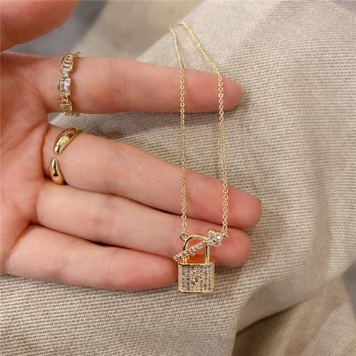 China New CLASSIC Jewelry Copper Necklace Charms Tiny Zircon Key Lock Pendant Necklace for sale