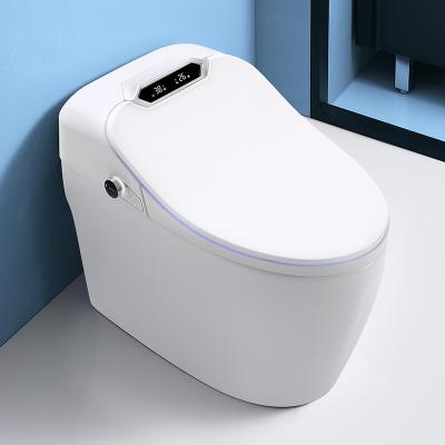 China 2020 New Design Automatic Toilet Strap Automatic Operation Ceramic WC Foot Control One Piece Smart Tankless Flushing Automatic Smart Toilets for sale