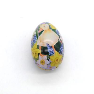 China Recycled Materials Holiday Promotion Metal Gifts Empty Egg Shaped Tin Box for sale