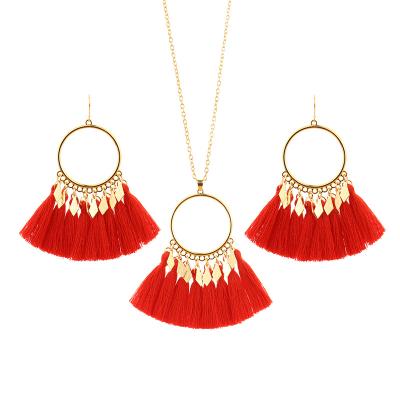 China Ethnic Bohemian Colorful Tassel Necklace Earrings Set Hand - Woven Earrings Gold Plated Sweater Chain Women Dress Jewelry Set for sale