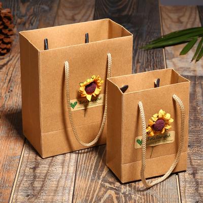 China New Style Fine Jewelry Handmade Simple Bag Rose Flower Sticker Kraft Paper Design Gift Packaging Box for sale