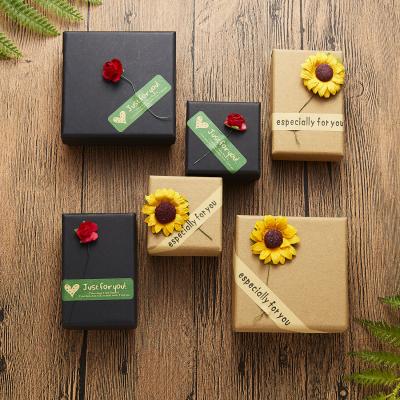 China Handmade Custom Paper Cardboard Magnetic Jewelry Boxes Packaging With Sticker And Flower Jewelry Box for sale