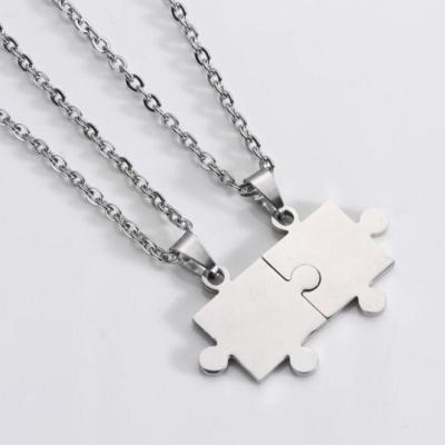 China Trendy Titanium White Customize Couples Stainless Steel Jewelry Set Puzzle Pendant Necklace for sale