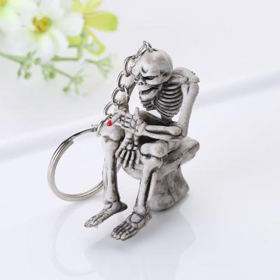 China Fashionable Creative Skull Toiletry Bag Purse Rubber Key Chain Key Chain Key Chain for sale