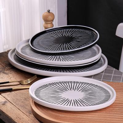 China Hotel Viable Creative White Western Food Tableware CANHUI Porcelain Dishes Porcelain Restaurant Oval Black Ceramic Dish for sale