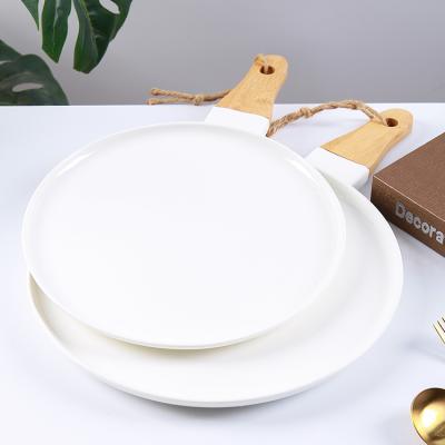 China CANHUI Hotel Sustainable Porcelain Restaurant Ceramic Pizza Plate Pizza Serving Plate With Bamboo Handle for sale