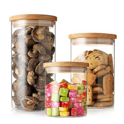 China High Borosilicate Glass Spiced Jar Freshness Preservation Small Cookie Food Airtight Glass Jar Container With Wooden Lid for sale