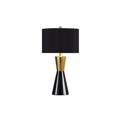 China Modern factory custom e27 black gold ceramic iron fabric modern indoor decorative hotel bedroom led table light for sale