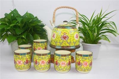 China Unique Fine China Ceramic Tea Set Gold And Yellow With Rattan Pot Handle for sale