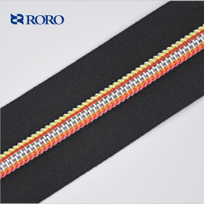 China Long Chain Rainbow No.5 /Golden Teeth Long Chain Trimming To White Tape Nylon Reel Zipper Tape 200 Yards for sale