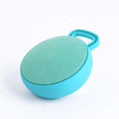 China Colorful Mini Wireless Waterproof Bluetooth Outdoor Portable Speaker Cloth Fabric Customized By Phone Print Function for sale