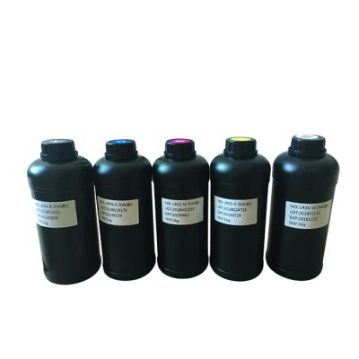 China soft flim flatbed printer led uv ink factory cmyk uv ink for Toshiba printhead for sale