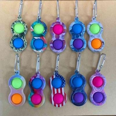 China Key Chain Toy Push Bubble Decompression Sensory Silicone Moving Person Toys Relaxing Single Squeeze Silicone Key Chain For Adults Kids for sale