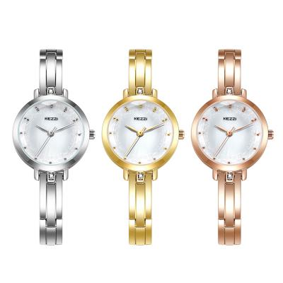 China Luxury Popular Gold Dress Ladies Watches No Flower Student Fashion Glass Wristwatch Waterproof Alloy Brand Series for sale