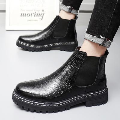 China Round Men Chelsea Genuine Leather Boots Fashion Non Slip High Top Sports Shoes Waterproof Winter Keep Warm Black Ankle Martens Boots for sale