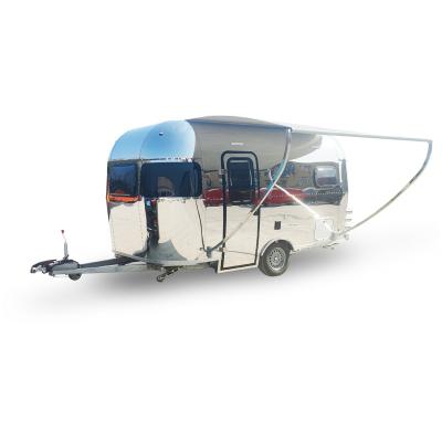 China Standard travel trailer UK airstream travel trailer with tent, camping trailer using AL-KO chassis for sale