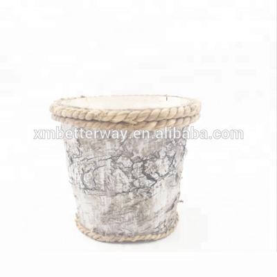 China Rustic Home Country Decoration Wrought Iron Planter With Bark for sale