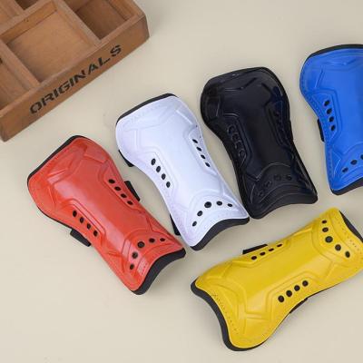 China New Durable Flat Professional Sports Shin Guards Soccer Adult Shin Guards for sale