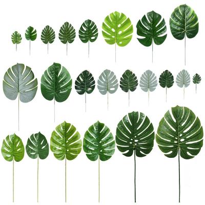 China Real touch nature plant sale monstera leaf plant wall decoration artificial palm leaf supplier for sale