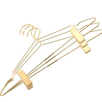 China Minimalist Rose Copper Gold Shiny Metal PantsTrousers Heavy Duty Hangers Pants Hangers with Adjustable Two Non Slip Clips Hanger for sale