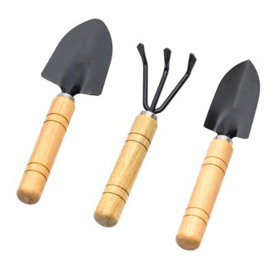 China Pastoral Plastic Spoon Mini Small Garden Walking Trench Digger Wheel Shovel Garden Stainless Steel Hand Plant Pot Cup for sale