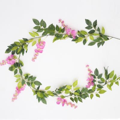 China Hot Selling Minimalist Wisteria Flower Tree Branches Plant Decoration Rattan Artificial Wedding for sale