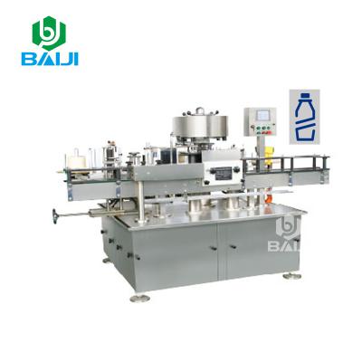 China Glass bottle automatic single adhesive sticker food head labeling machine/label applicator for sale