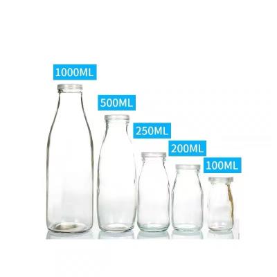 China Customized Logo 250ml 500ml Fruit Juice Milk Glass Container Beverage Cheap Drinking Bottles for sale