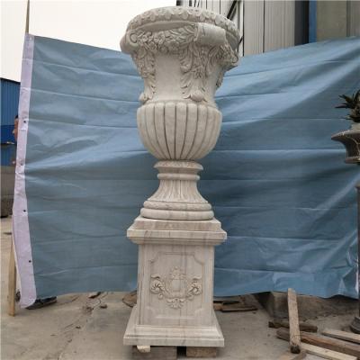 China Large Durable And Artistic Granite Gardening Natural Planter Use Stone Carved Antique Flower Pots With Angel Statues for sale