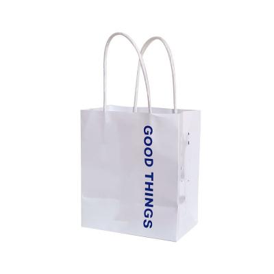 China Cartoon Recyclable Mini Gift Paper Bag Portable Creative Funny Text Birthday Gift Bag. for sale