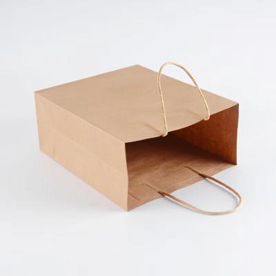 China Recyclable Paper Bag Kraft Shopping Bags Christmas Gift Bags With Handle For Christmas Party for sale