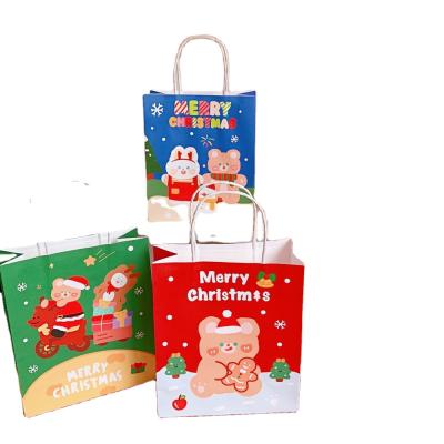 China Customized Luxury Recyclable Logo Factory Price Cartoon Color Paper Christmas Gift Bags Packaging for sale