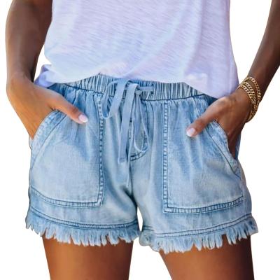 China Breathable 2023 WOMEN wait high elastic waistband with strings fringed raw edge hem shorts denim pants for sale