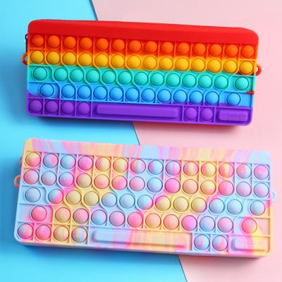 China Amazon Waterproof Hot Seller Large Silicone Pen Pouch Bubble Push Snap Push Button Toy Rainbow Keyboard Pencil Case for sale