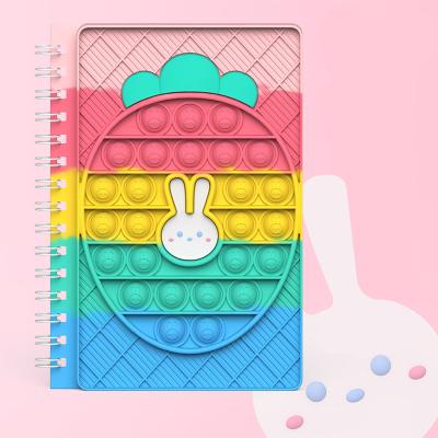 China Cartoon Pop Design Notebook A6 A5 Tie Dye Silicone Pop Anti Bubble Cute Recyclable Toy Notebook Push Snap Cover Effort for sale