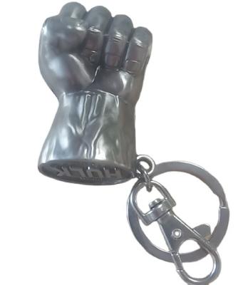 China Cheap Custom Shape Metal Fist Hand Alloy Europe Souvenir Hot Selling Key Chain With Personalized Logo for sale