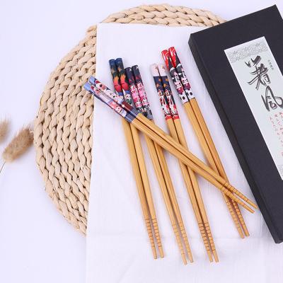 China Sustainable Natural Handmade Wavy Wooden Chopsticks Healthy Chinese Chop Sticks Reusable Sushi Food Stick Gift Tableware for sale