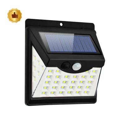 China Most Garden Product 3 Sides 40 LED Solar Wall Light Motion Sensor Outdoor Solar Garden LED Wall Light for sale