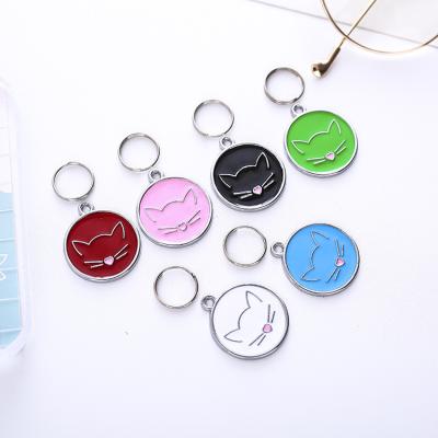 China Personalized Cute Cat Pattern Round Pet Name Tag Customized Small Cheap Dog Cat Pet ID Tag for sale