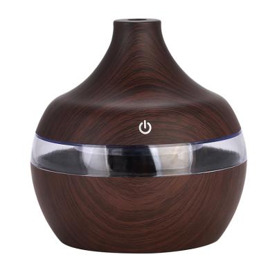 China Household Free Sample 7 Color Light Home Diffuser Wood Grain Ultrasonic Oil Diffuser Led Aroma Baby Portable Humidifier 130ML for sale