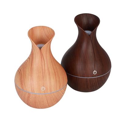 China Large Grain Free Sample Garage Essential Oil Humidifier High Quality Wooden Aromatic Air Diffuser Home Essential Humidifier for sale