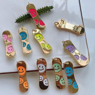 China Multicolor Hiphop Hiphop Enamel Skateboard Jewelry Findings With Smile Pattern Pendant For Jewelry Making for sale