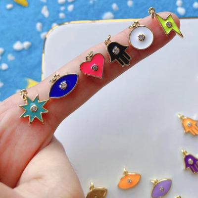 China Colorful Hiphop Enamel Eye Heart Sun Shape Gold Plated Jewelry Findings For Jewelry Making for sale