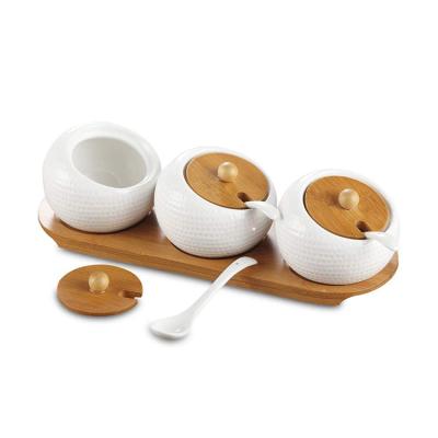 China Viable Wholesale Container Porcelain Condiment Jar Spice Sugar Pots With Bamboo Lids for sale