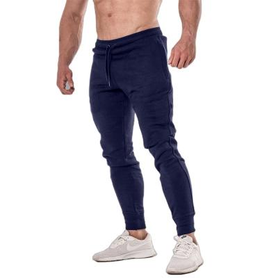 China 2022 Sportswear Slim Fit Men's Fitness Soccer Running Foot Leisure Breathable Pants Small Tie Tight Training Pants for sale